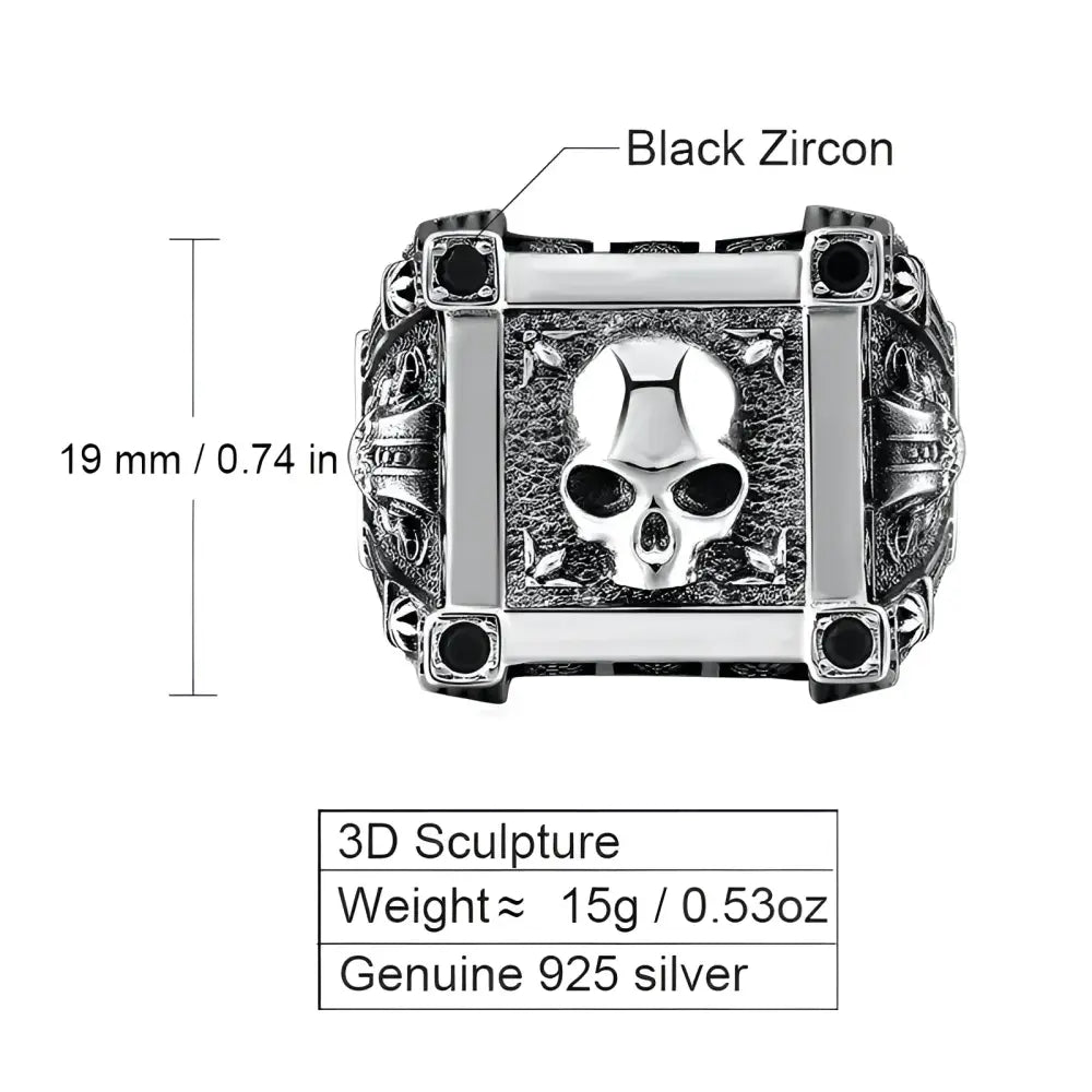 Silver skull ring with black zircon accents.