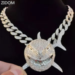 Rhinestone-covered shark pendant necklace.